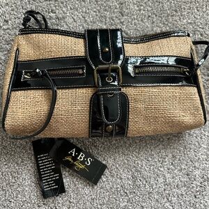 A.B.S. Tan and Black clutch (raw linen canvas and patent genuine leather).$55